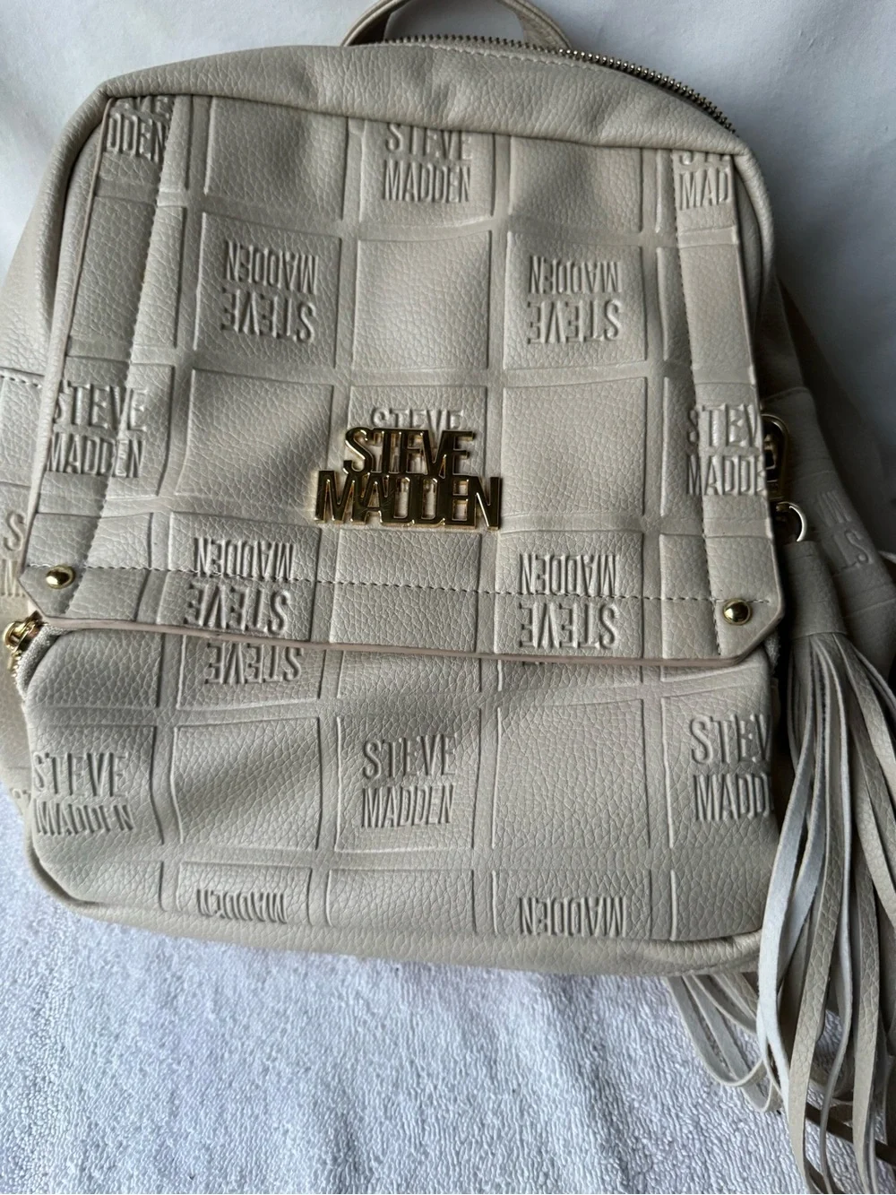 Steve Madden Cream Quilted Logo Backpack with Tassel